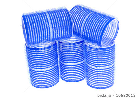 a few blue hair curlers on a white background a few blue hair curlers on a white background 10680015