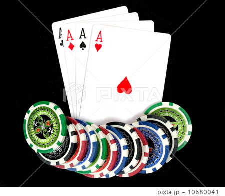 Cards and ultimate poker chips on black Cards and ultimate poker chips on black 10680041