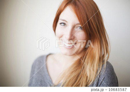 Portrait of attractive young woman with dyed redhead Portrait of attractive young woman with dyed redhead 10683587