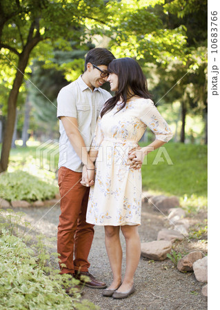 Couple standing in park 10683766
