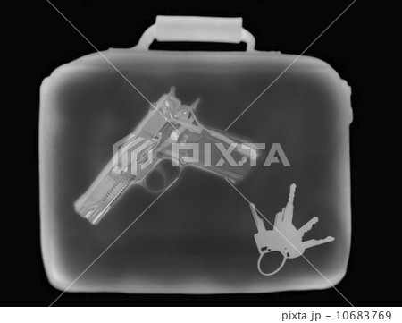 X-ray image showing handbag containing pistol and set of keys 10683769
