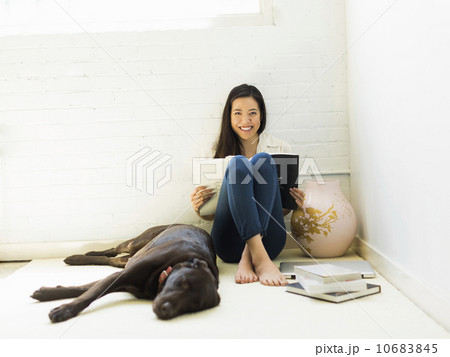 Young woman with labrador  10683845