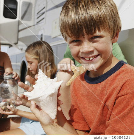 Couple hiking with GPS in forest 10684125