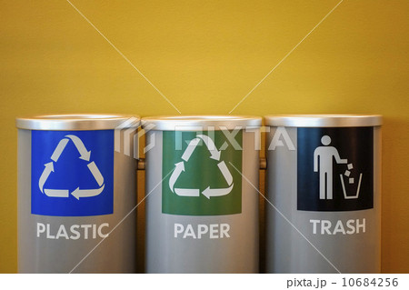 Recycling bins on yellow background Recycling bins on yellow background 10684256