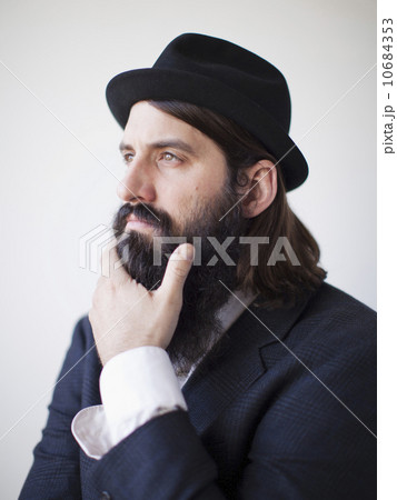 Portrait of contemplative bearded young man 10684353
