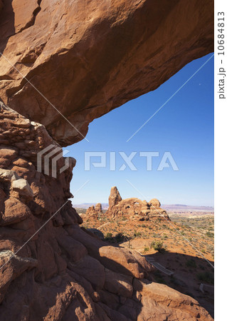 Close up of natural arch against clear blue sky 10684813