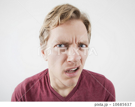 Studio Shot of mid adult man expressing anger 10685637