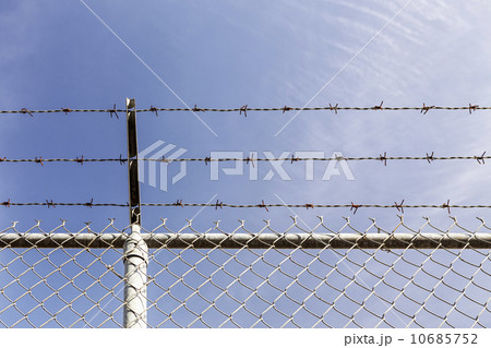 Low angle view of chainlink fence Low angle view of chainlink fence 10685752