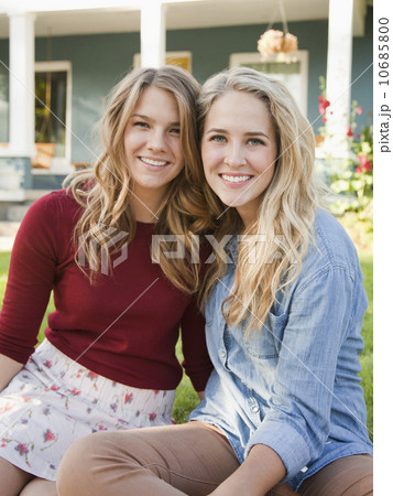 Portrait of two young women cheek to cheek Portrait of two young women cheek to cheek 10685800
