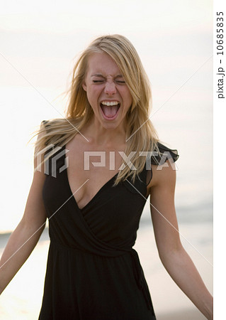 Young woman cheering Young woman cheering 10685835