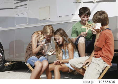 Couple hiking with map in forest Couple hiking with map in forest 10685836