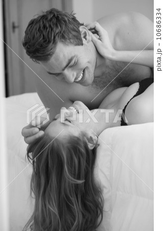 Young couple kissing in bed 10686334