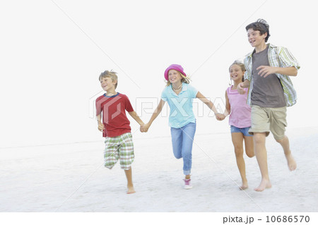 Couple playing with football Couple playing with football 10686570