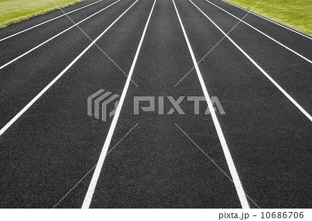 Empty running tracks in sports stadium Empty running tracks in sports stadium 10686706
