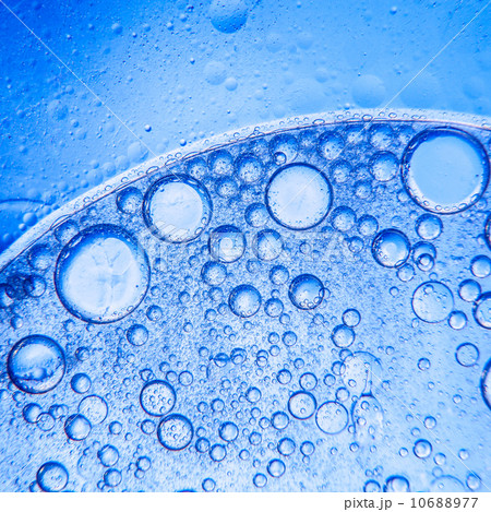 Oil bubbles on a water surface Oil bubbles on a water surface 10688977