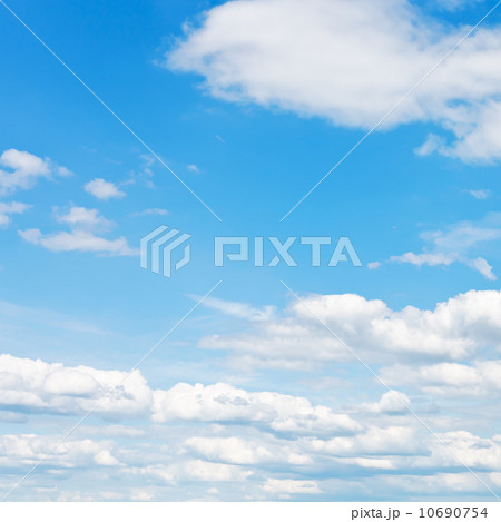 blue sky with white fluffy clouds 10690754