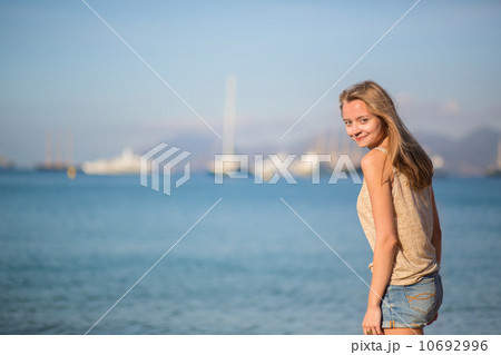Happy girl on a beach 10692996
