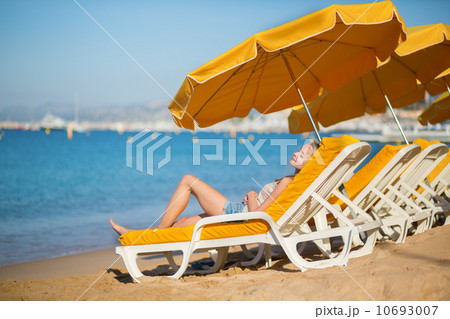 Beautiful girl relaxing on a beach chair 10693007