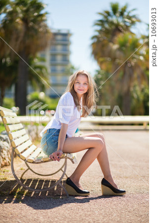 Young beautiful girl enjoying sunny day in Cannes 10693013