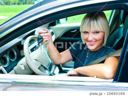 woman driver with car key 10693169