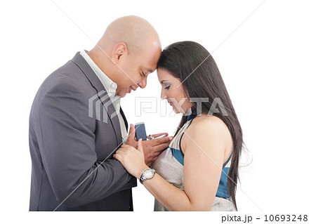 african man making a proposal to his girlfriend 10693248