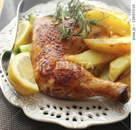 roasted chicken leg with potato and lemon  10695016