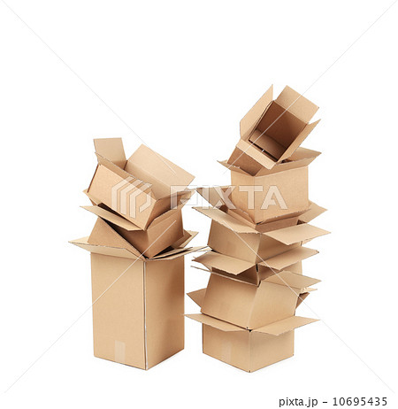 Stacks of cardboard boxes. 10695435