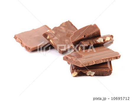 Tasty morsel of milk chocolate with nuts 10695712