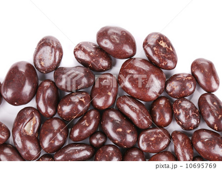 Dark brown dragee in chocolate cover. Dark brown dragee in chocolate cover. 10695769