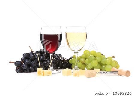 Two glass of wine with grapes and corkscrew. 10695820