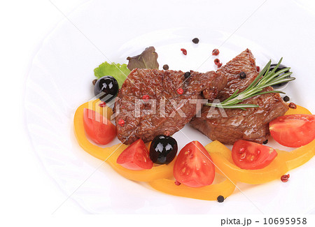 Grilled steak with fresh vegetables. Grilled steak with fresh vegetables. 10695958