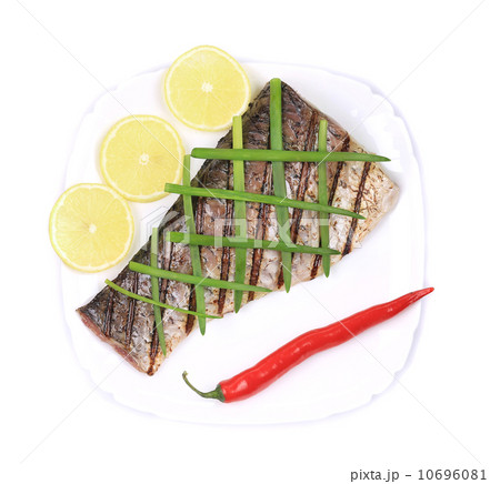 Grilled carp fillet on plate with onion and lemon Grilled carp fillet on plate with onion and lemon 10696081