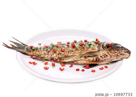Fried fish on a white plate Fried fish on a white plate 10697733