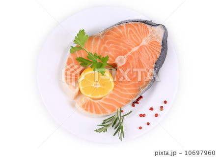 Fresh salmon steak with lemon and pepper. 10697960