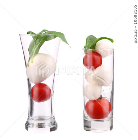 Tomatoes and mozzarella balls in glass. 10698105