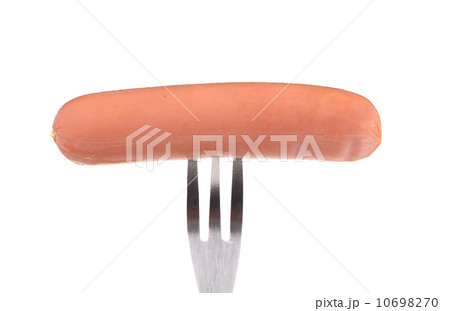 Fresh sausage on a fork. 10698270