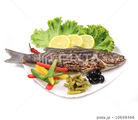 Grilled seabass on plate. 10698466