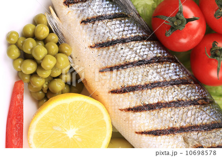 Grilled fish and vegetables. Grilled fish and vegetables. 10698578