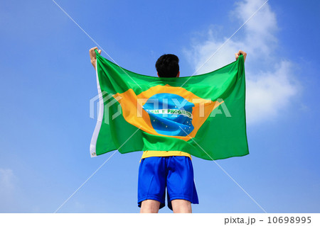 Excited man holding a brazil flag 10698995
