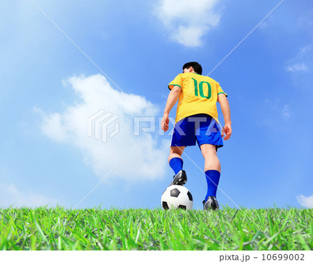 Soccer player man with ball 10699002