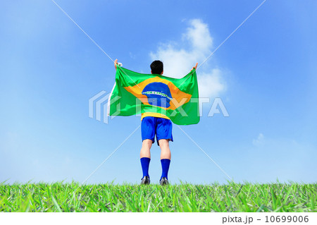 Excited man holding a brazil flag 10699006