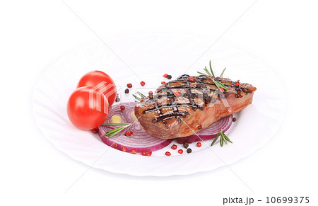 Beef steaks with rosemary and tomatoes. Beef steaks with rosemary and tomatoes. 10699375