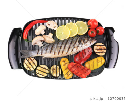 Grilled seabass on grill with vegetables. 10700035