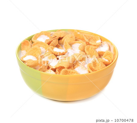 Bowl of sugar-coated corn flakes with milk. 10700478