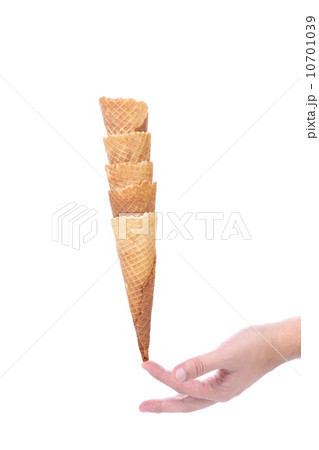 Hand hold stake of wafer cup for ice-cream. Hand hold stake of wafer cup for ice-cream. 10701039