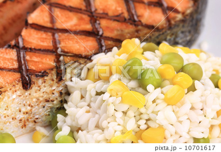 Grilled salmon steak with rice on plate. Grilled salmon steak with rice on plate. 10701617