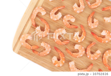 Boiled shrimps on cutting board. Boiled shrimps on cutting board. 10702816