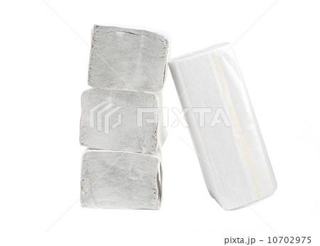 Stack of folded disposable papers. 10702975