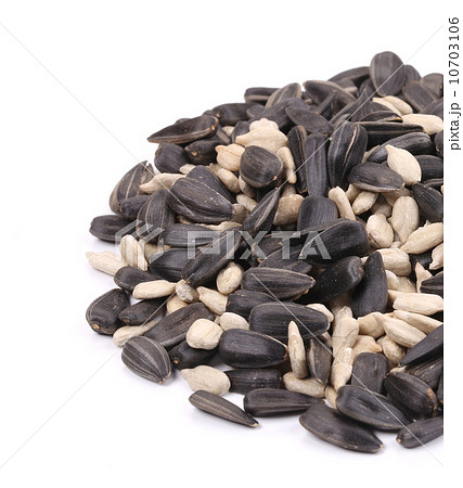 Bunch of white and black sunflower seeds. Bunch of white and black sunflower seeds. 10703106