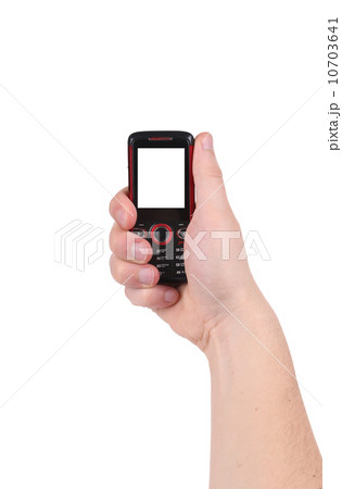 Mobile phone in hand. 10703641